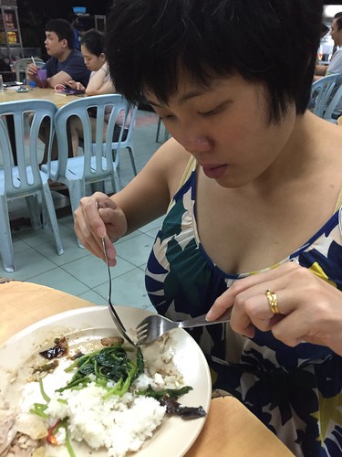 Pregnant wife eating fish