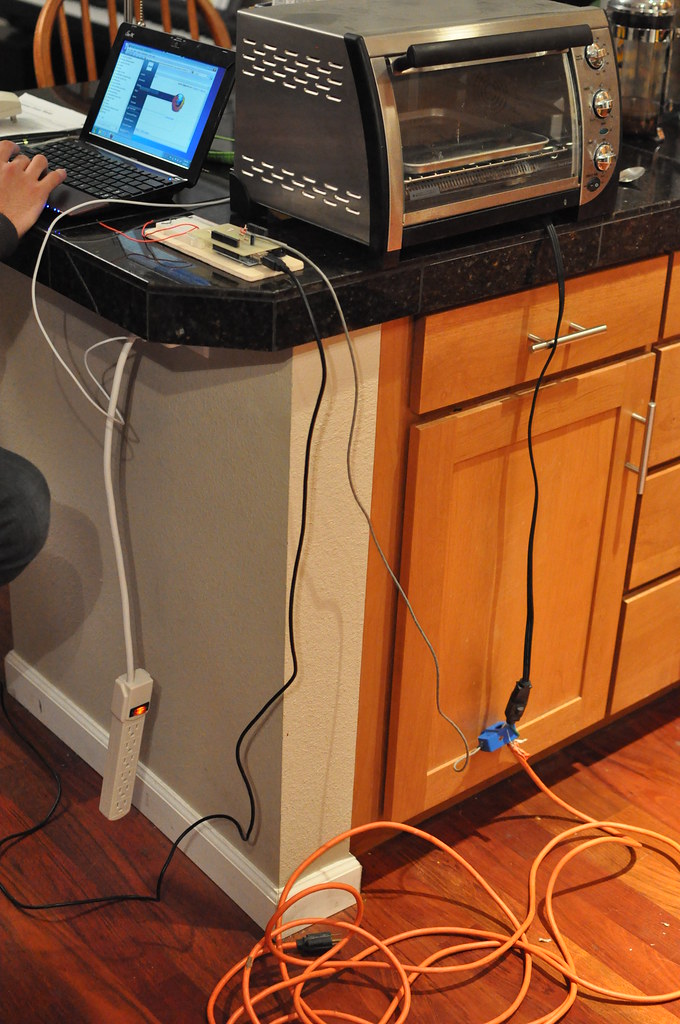 An Arduino, a laptop, a toaster, and an extension cord
